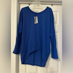 Zanzea Asymmetric Top hi-low quarter Sleeves size small.